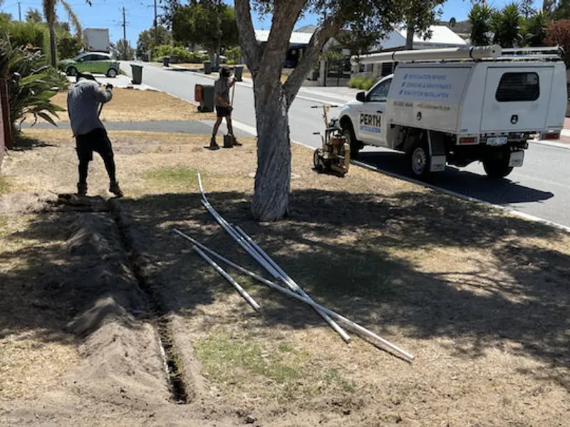 Reticulation technicians installing a new system