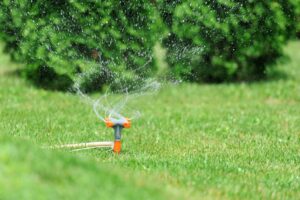 watering lawn with sprinkler system Perth