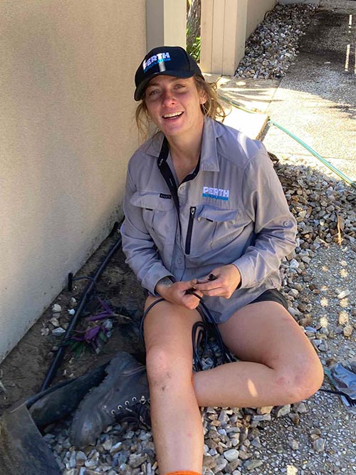 Reticulation technician installing sprinklers