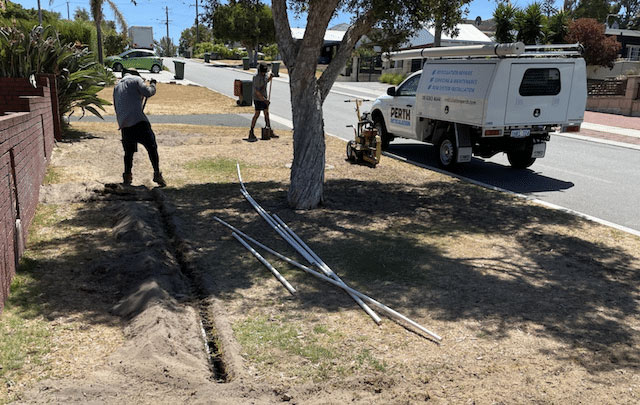 Reticulation technicians installing new irrigation system in perth