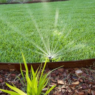 reticulation sprinkler watering lawn